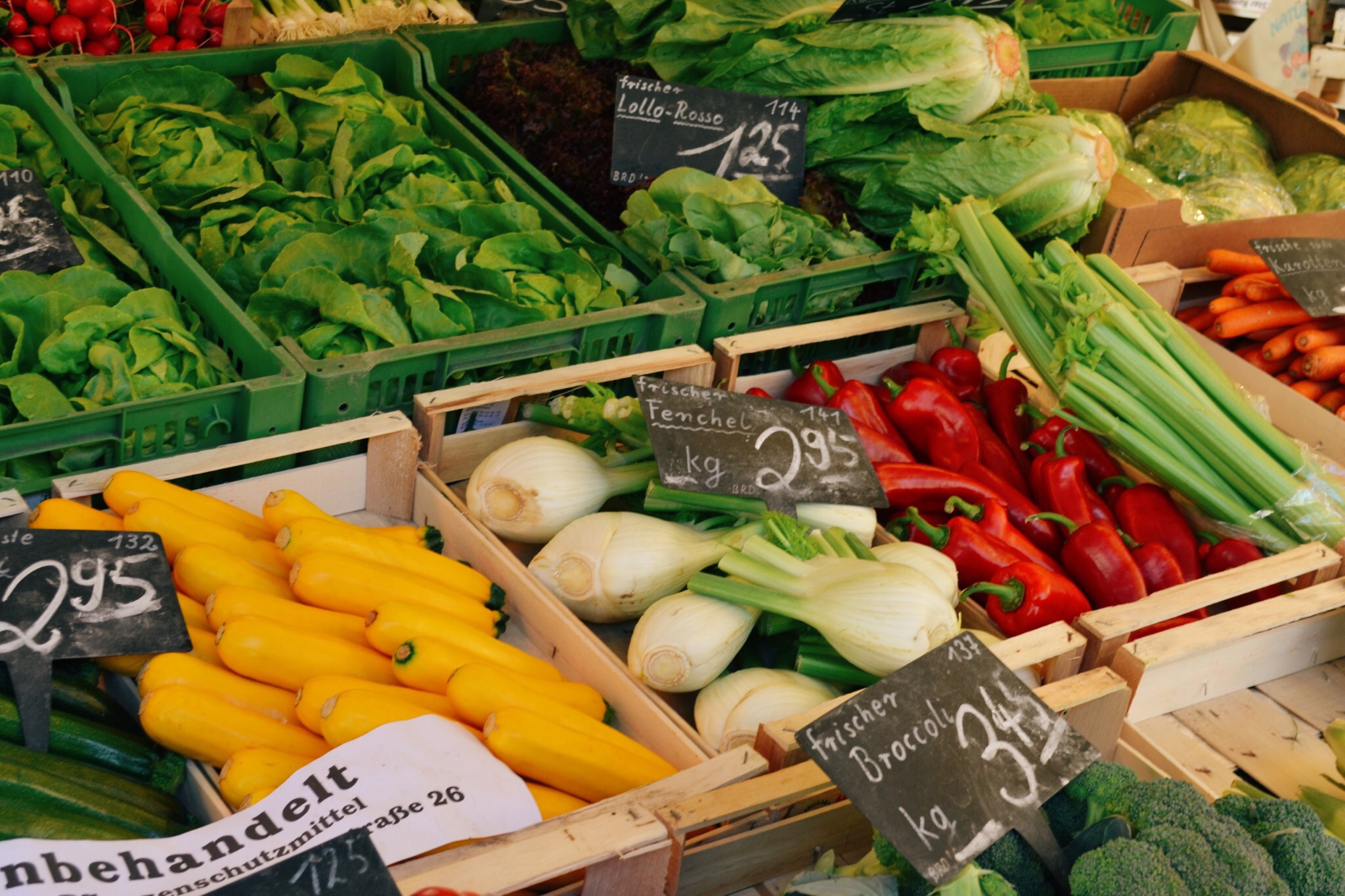 Close up of a local farmer fruit stand with a variety of colorful fruits and vegetables