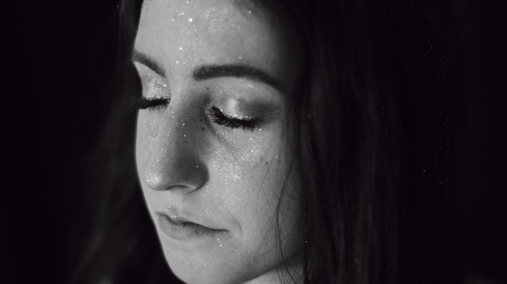 Young women close up in black and white